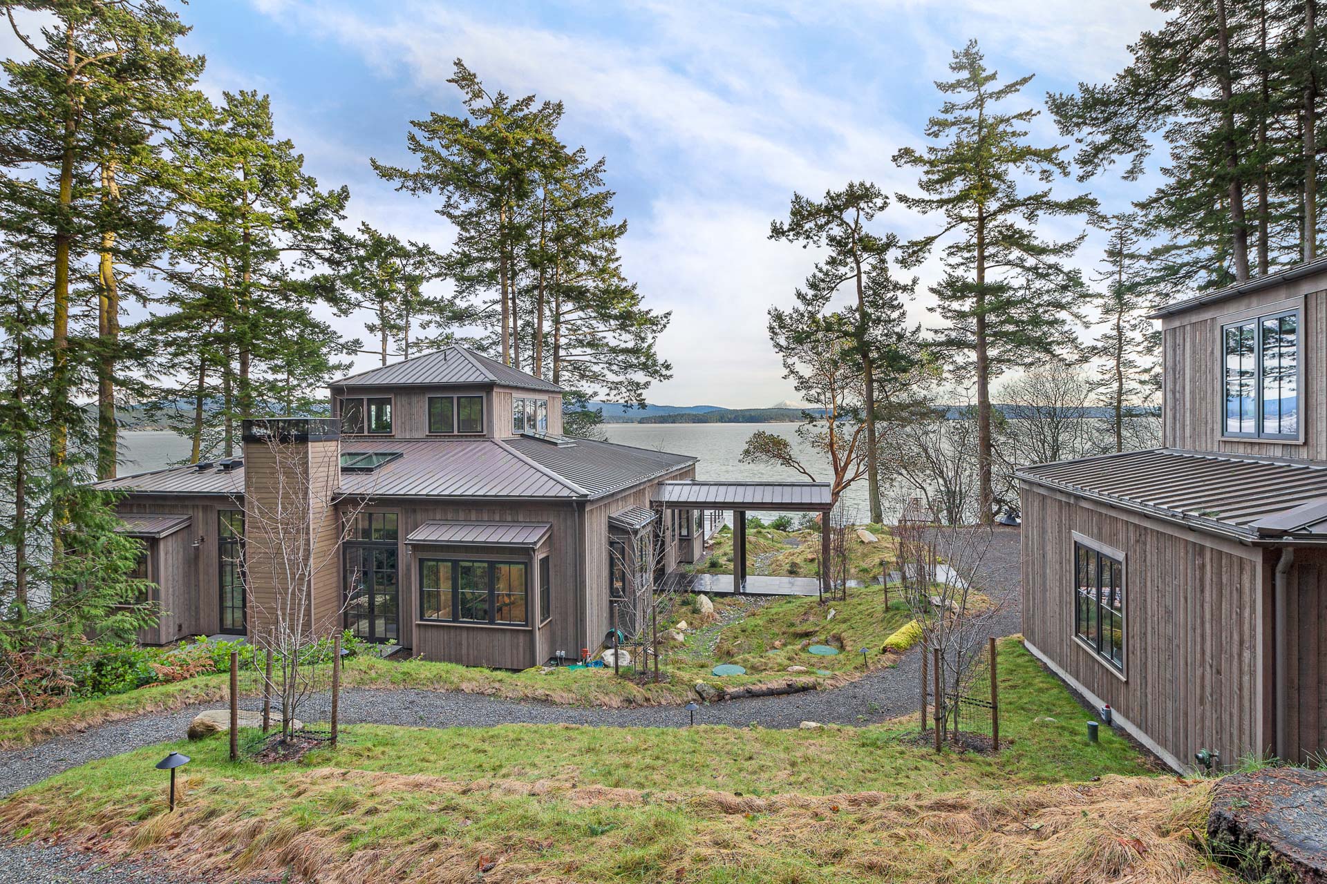 Friday Harbor Remodel view of house during the day with water in background | True Bearing Built