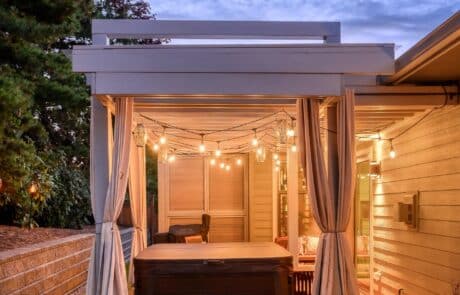 Bellingham Custom Pergola view from the right side with lights on | True Bearing Built